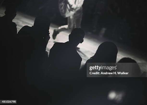 Models walk the runway during the Greg Lauren fashion show at Skylight Clarkson Sq during New York Fashion Week: Men's S/S 2016 on July 15, 2015 in...