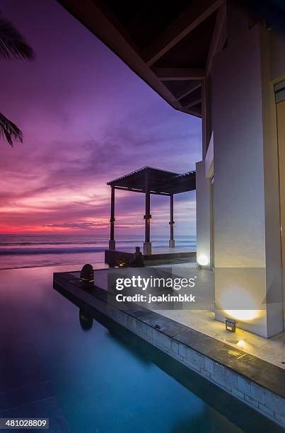 sunset in a resort by the sea - bali luxury stock pictures, royalty-free photos & images
