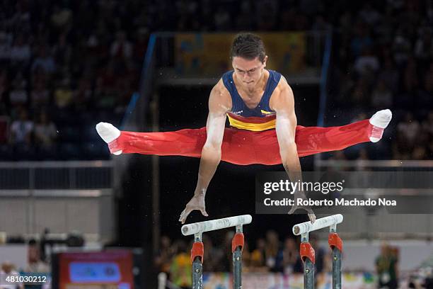 Toronto PanAm Games 2015: Jossimar Calvo Moreno from Colombia working in the parallel bars in the Gymnastic Artistic event. He goes to get the Gold...