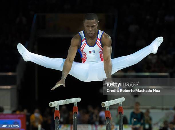 Toronto Panam Games 2015: Manrique Larduet from Cuba works in the parallel bars in Gymnastic Artistic. He ends in second place and gets the Silver...