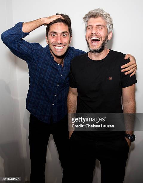 Producer / TV personality Nev Schulman and director / TV personality Max Joseph attend the 'Desert Voices' opening exhibition at De Re Gallery on...