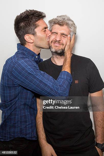 Producer / TV personality Nev Schulman and director / TV personality Max Joseph attend the 'Desert Voices' opening exhibition at De Re Gallery on...