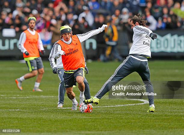 Luka Modric and Gareth Bale of Real Madrid during a Real Madrid training session at Melbourne Cricket Ground on July 17, 2015 in Melbourne, Australia.