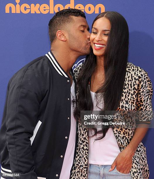 Player Russell Wilson and singer Ciara arrive at the Nickelodeon Kids' Choice Sports Awards 2015 at UCLA's Pauley Pavilion on July 16, 2015 in...