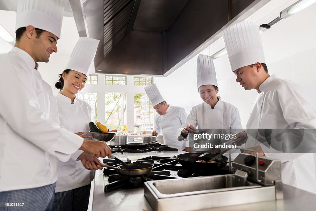 Group of chefs cooking