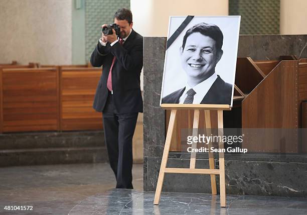 Portrait of recently-deceased CDU politician Philipp Missfelder stands on display at a memorial service for him at St. Hedwig cathedral on July 17,...