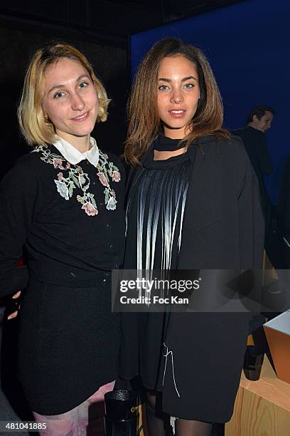 Marine Sainsily and a guest attend the 'La Creme De La Creme' After Party at the Show Case Club on March 27, 2014 in Paris, France.