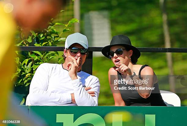 Pat Rafter and Anna Caple, General Manager Performance Tennis Australia look on from courtside as Nick Kyrgios of Australia reacts in his match...