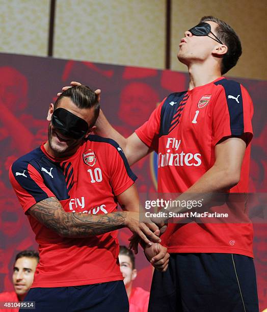 Jack Wilshere and Wojciech Szczesny of Arsenal attend a fans party at the Shnagri-La hotel on July 17, 2015 in Singapore.