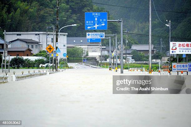 Roadl is inundated due to the heavy rain triggered by Thphoon Nangka on July 17, 2015 in Anan, Tokushima, Japan. One man was killed, another was...