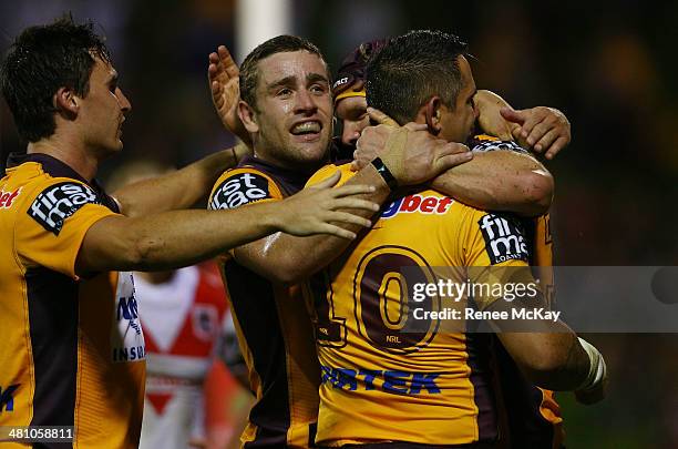 Broncos celebrate the try of Todd Lowrie during the round four NRL match between the St George Illawarra Dragons and the Brisbane Broncos at WIN...