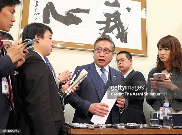 Your Party head Yoshimi Watanabe speaks to media reporters at the Diet building on March 27, 2014 in Tokyo, Japan. The head of the minor opposition...