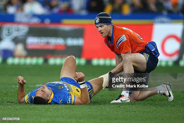 Corey Norman of the Eels receives attention for an injury during the round 19 NRL match between the Parramatta Eels and the Canterbury Bulldogs at...