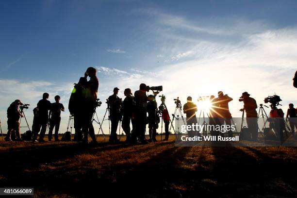 International media await the arrival of a RAAF C17 Globemaster aircraft carrying a Navy Seahawk helicopter at the RAAF base in Bullsbrook on March...