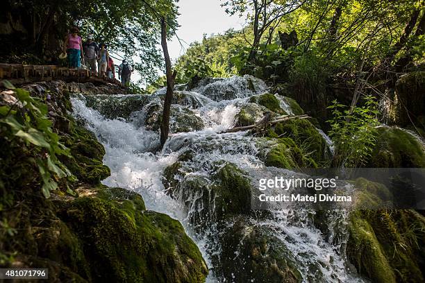 Water falls down from the Milanovac lake at Plitvice Lakes National Park on July 6, 2015 near Plitvicka Jezera, Croatia. Plitvice Lakes National Park...