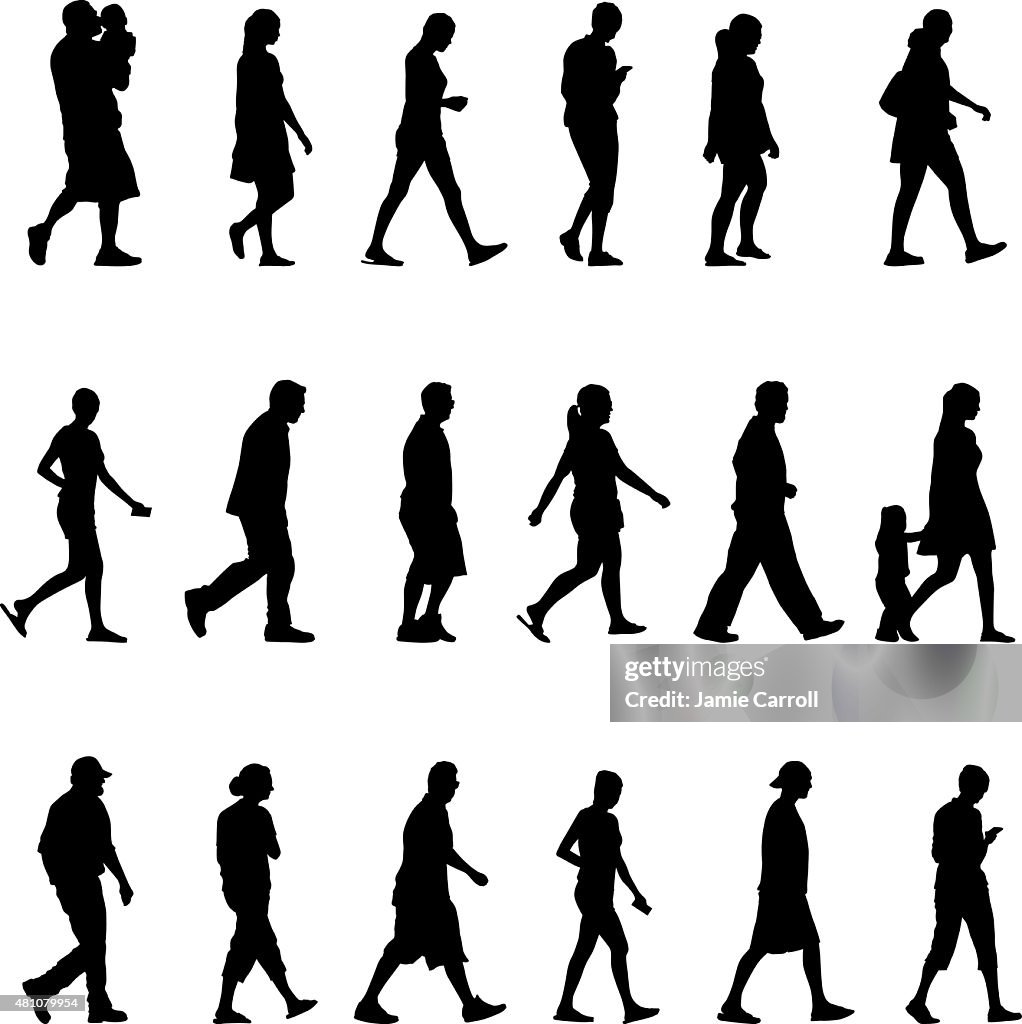 Large group of silhouette people walking