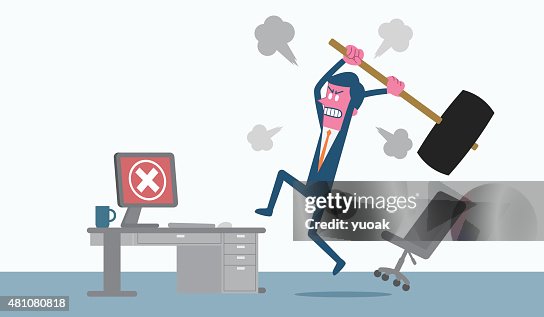 Man angry at computer Man angry at computer