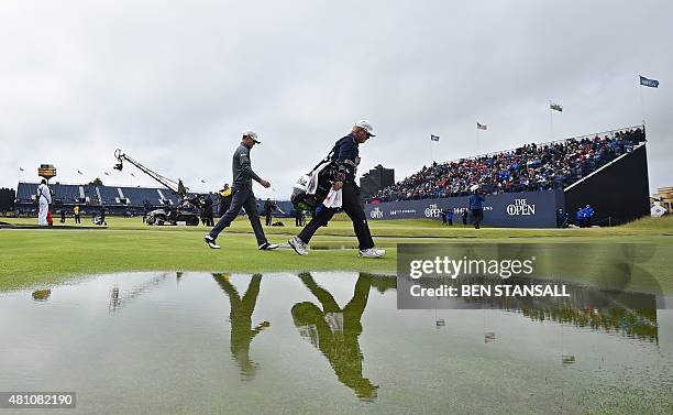 Golfer Zach Johnson walks down the 2nd fairway during his second round on day two of the 2015 British Open Golf Championship on The Old Course at St...