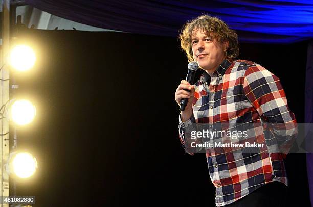 Comedian Alan Davies performs on the Comedy Stage on day 2 of Latitude Festival at Henham Park Estate on July 17, 2015 in Southwold, England.