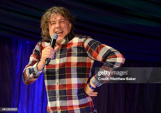 Comedian Alan Davies performs on the Comedy Stage on day 2 of Latitude Festival at Henham Park Estate on July 17, 2015 in Southwold, England.