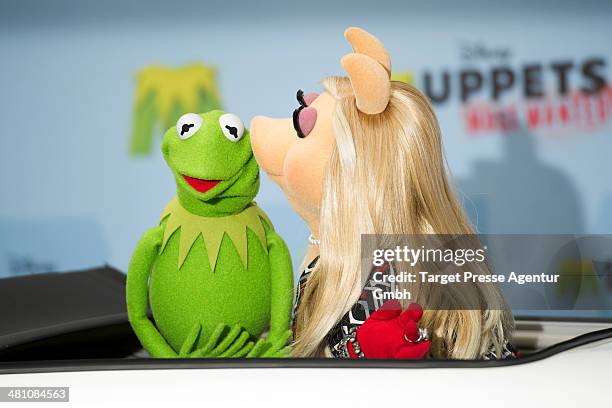 Kermit and Miss Piggy attend the 'Muppets most wanted' Photocall at Sony Centre on March 28, 2014 in Berlin, Germany.