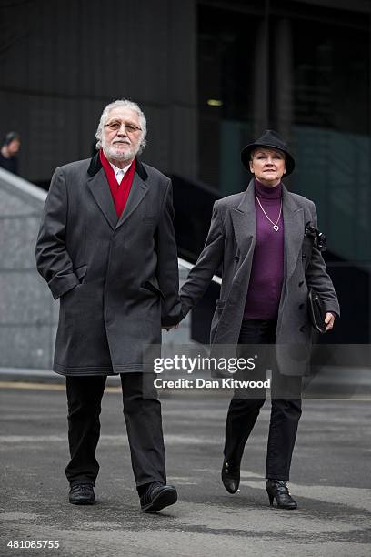 Dave Lee Travis and his wife Marianne Griffin arrive at Southwark Crown Court on March 28, 2014 in London, England. Dave Lee Travis, whose real name...