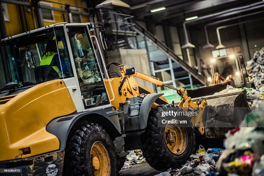 Earth mover in the garbage dump