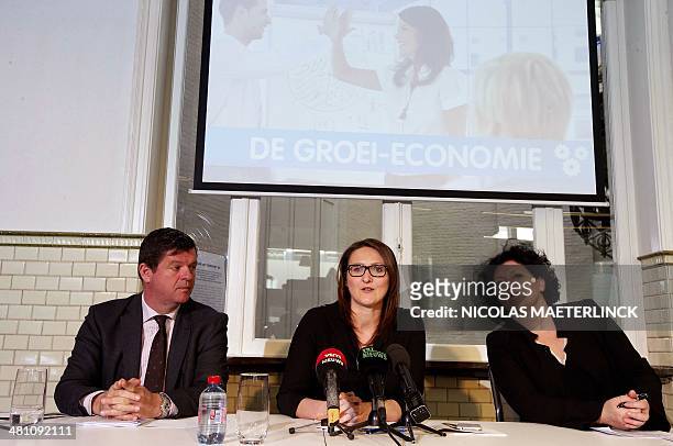 Flemish liberal Open Vld party member Bart Tommelein, Open Vld's chairwoman Gwendolyn Rutten and Belgian minister of Justice Annemie Turtelboom give...