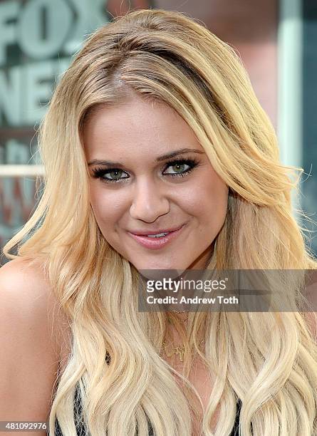 Singer Kelsea Ballerini poses for a photo during "FOX & Friends" All American Concert Series outside of FOX Studios on July 17, 2015 in New York City.