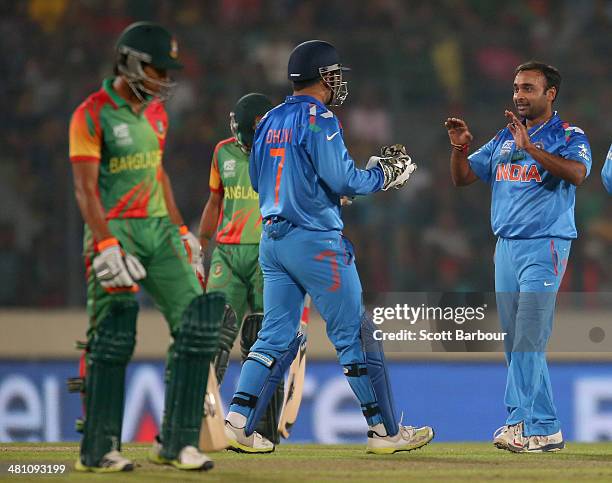 Amit Mishra of India is congratulated by his teammates after dismissing Anamul Haque of Bangladesh during the ICC World Twenty20 Bangladesh 2014...