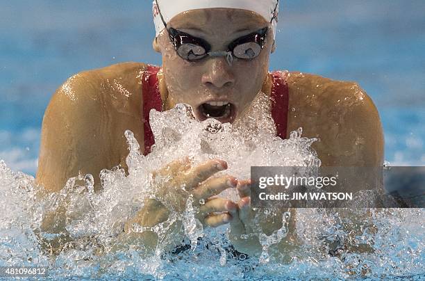 Rachel Nicol of Canada competes in the Women's 100M Breaststroke preliminaries at the 2015 Pan American Games in Toronto, Canada, July 17, 2015. AFP...