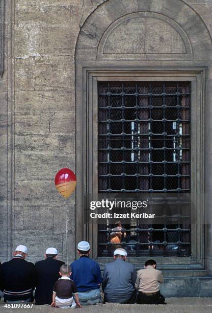 prayer time in the fatih mosque in istanbul - fatih mosque stock pictures, royalty-free photos & images