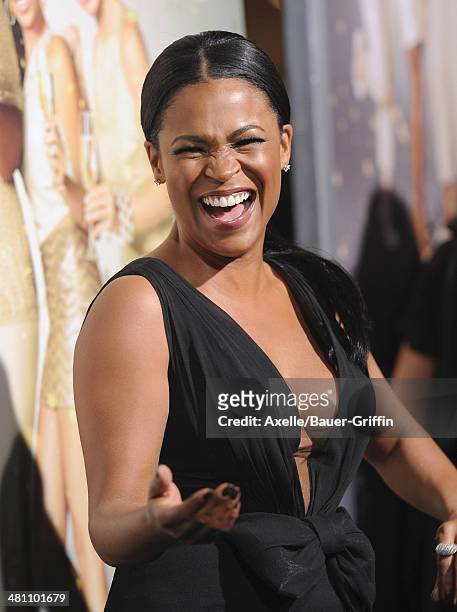 Actress Nia Long arrives at the Los Angeles premiere of 'Tyler Perry's The Single Moms Club' at ArcLight Cinemas Cinerama Dome on March 10, 2014 in...