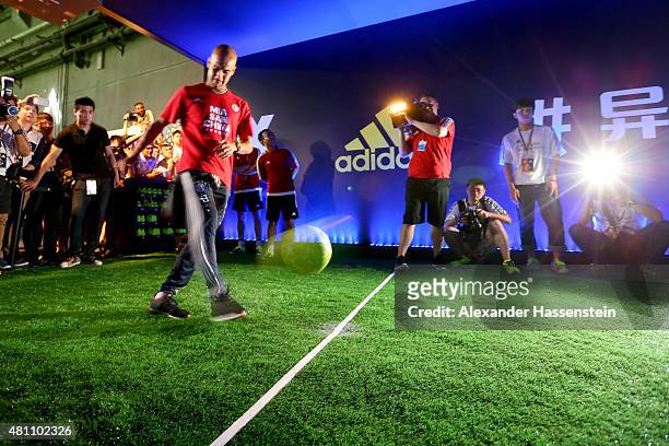 Josep Guardiola, head coach of FC Bayern Muenchen attends a adidas 2 vs 2 urban football match promotion even at Beijing Film Director Center during...