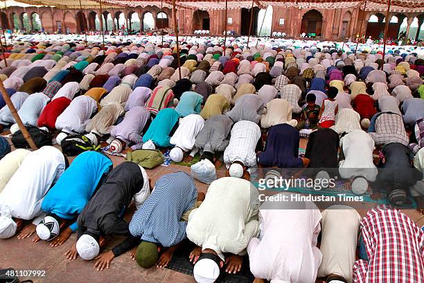 Muslims offer prayer on the occasion of Eid al-Fitr at Jama Masjid on July 17, 2015 in New Delhi, India. The Islamic Eid al-Fitr holiday celebrates...