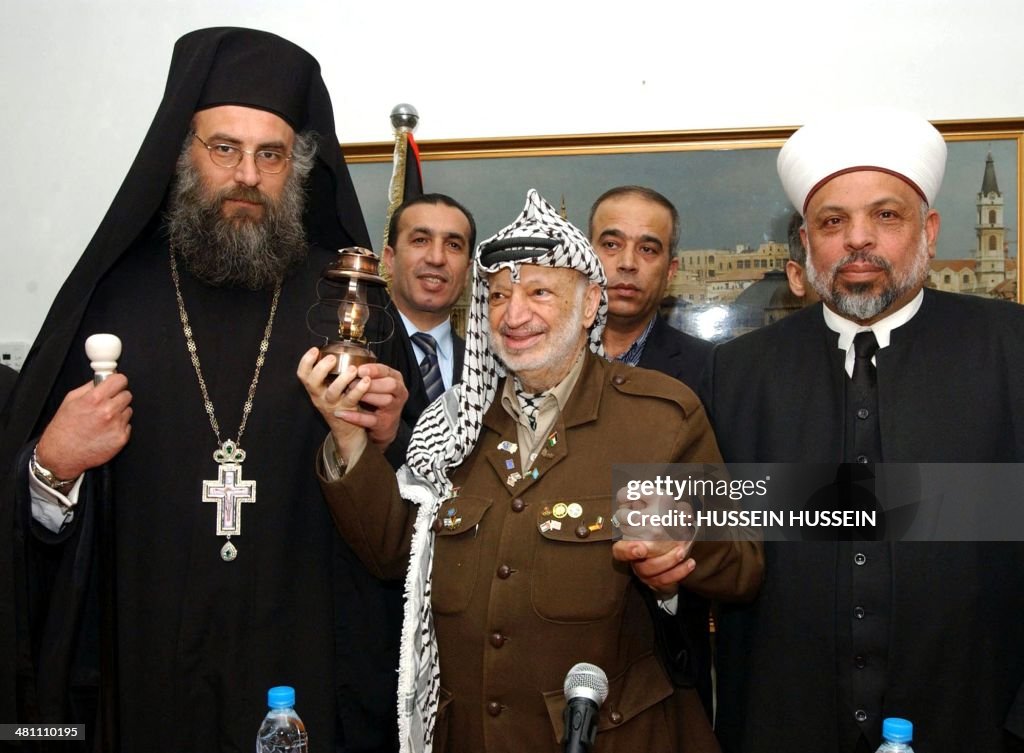 MIDEAST-PALESTINIAN-EASTER-HOLY-FIRE-ARAFAT