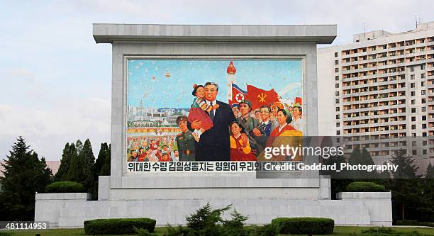 north korea dprk: propaganda billboard with kim il sung - kim il sung stock pictures, royalty-free photos & images