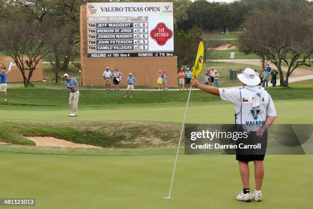 Harrison Frazar chips over a bunker on the 16th during Round Two of the Valero Texas Open at TPC San Antonio AT&T Oak Course on March 28, 2014 in San...