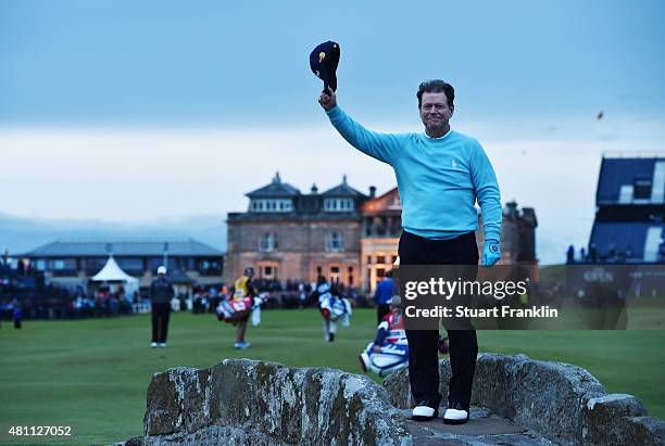 Tom Watson of the United States waves to the crowd from Swilcan Bridge in honor of his final Open Championship appearance during the second round of...