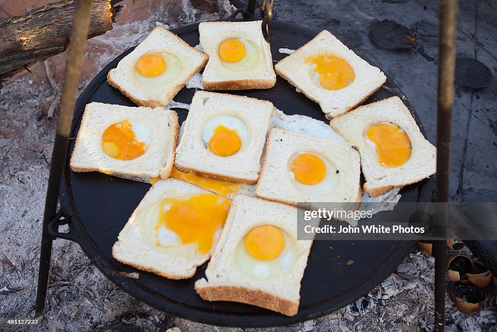 Eggs and bread on a BBQ. South Australia