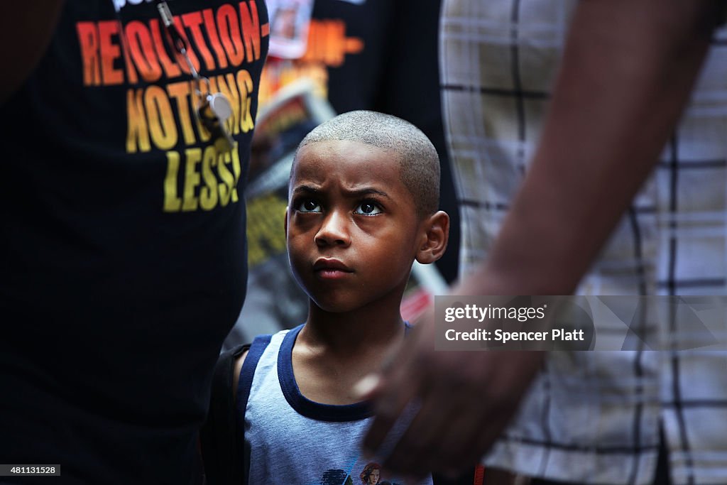 Protestors Rally Against Police Violence 1 Year After Eric Garner's Death