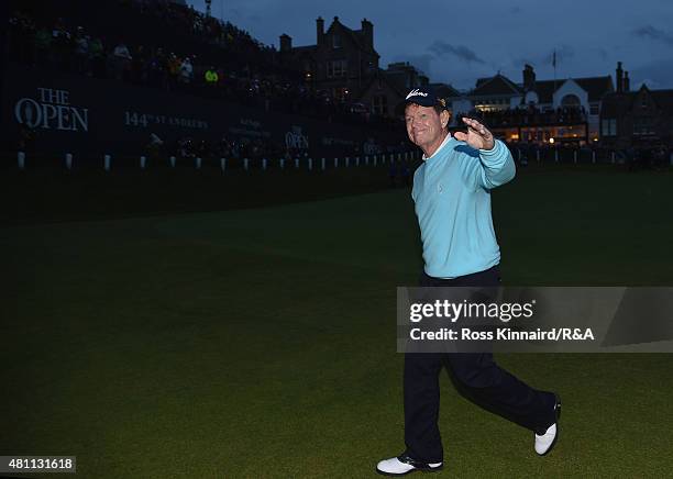 Tom Watson of the United States acknowledges the crowd on the 18th hole in honor of completing his final Open Championship after his second round of...