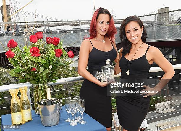 Baron Tequila representatives attend the Gotham Magazine Cruise at the Sunset Soiree at Pier 40 on July 15, 2015 in New York City.