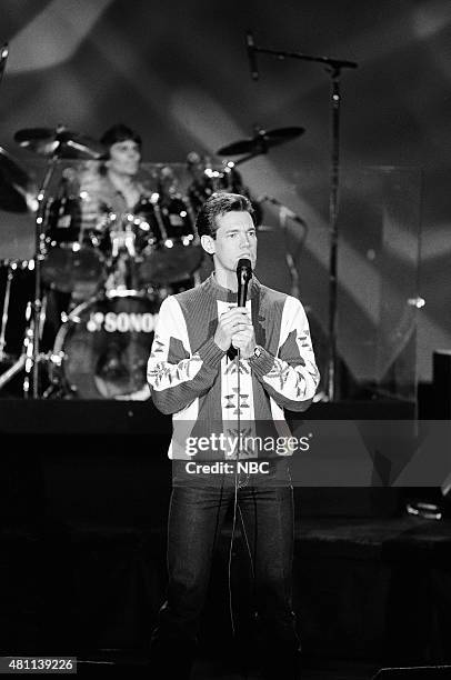 Pictured: Musical guest Randy Travis performs on December 5, 1990 --