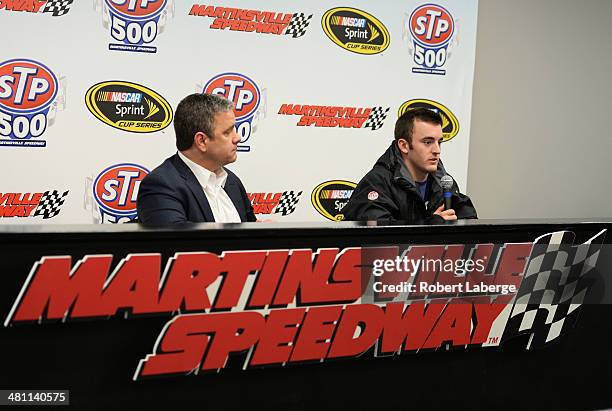 Dr. Michael Lynch, NASCAR vice president of green innovation, and Austin Dillon, driver of the Dow Chevrolet, speak at a press conference for NASCAR...