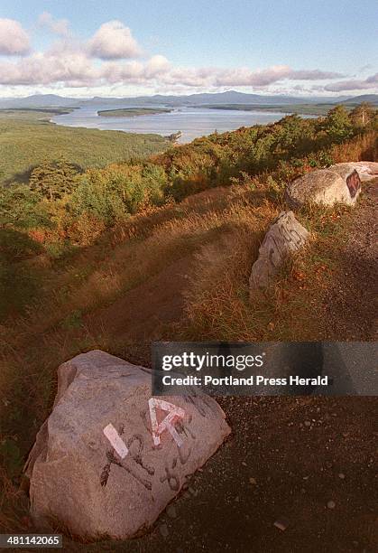 Sunday, September 10, 1995 --A white blaze and Appalachian Trail symbol mark the crossing of the trail and Route 17 near Oqossoc, Maine....