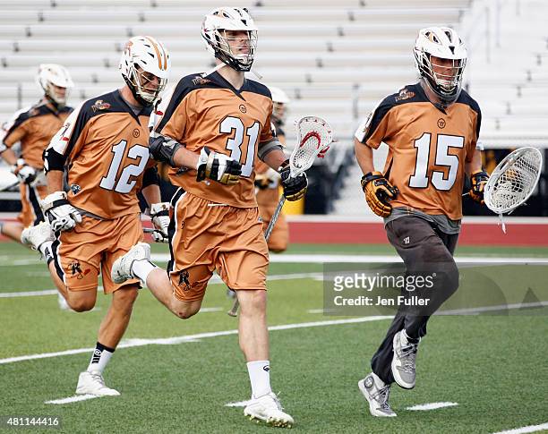 John Ranagan, John Galloway and Justin Turri of the Rochester Rattlers take to the field to play the Charlotte Hounds at Eunice Kennedy Shriver...