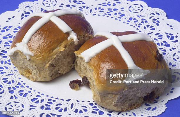 Staff Photo by John Ewing, Tue, Apr 10, 2001: Fresh baked hot cross buns, a traditional Easter season treat.