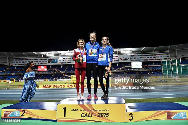 Michaela Hruba of the Czech Republic, gold medal, Ieva Turke of Latvia, silver medal, and Lada Pejchalova of the Czech Republic celebrate on the...
