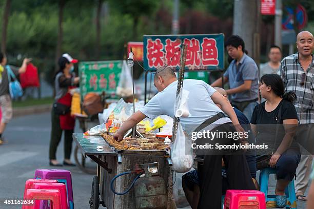 corner of the street in beijing residence area - lancashire hotpot stock pictures, royalty-free photos & images